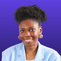 Photo de profil professionnelle de N'gnima Faty avec cheveux afro portant un blazer bleu sur fond violet.